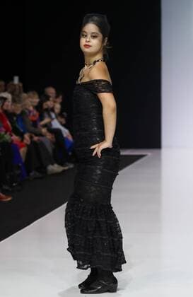 MOSCOW, RUSSIA - MARCH 23, 2017: A model showcases a creation during a catwalk show for the NP Open World collection at the Moscow Fashion Week, at the Gostiny Dvor Shopping and Exhibition Centre. Open World is a non-profit partnership helping integrate people with disabilities. Vyacheslav Prokofyev TASS  TS045354