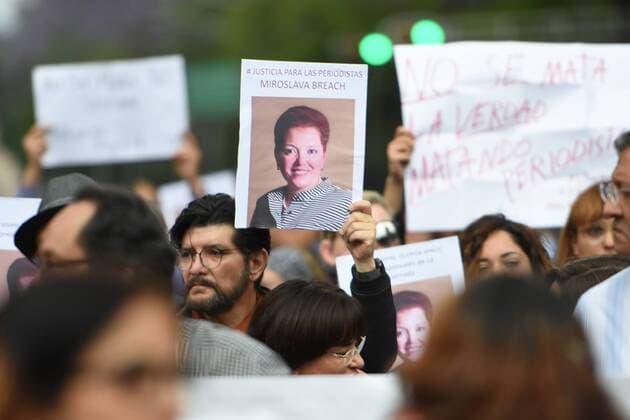 March 25, 2017 - Mexico City, Mexico - A man Lift a portrait of murdered journalist Miroslava Breach during a protest against of journalists murdered in Mexico at Reforma Avenue on March 25, 2017 in Mexico City, Mexico Mexico City Mexico  - ZUMAn230 20170325_zaa_n230_566 Copyright: xCarlosxTischlerx
