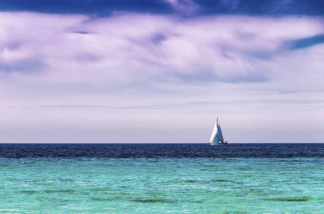 Spain, Menorca, Son Bou, sailing boat on the sea  SMAF00729