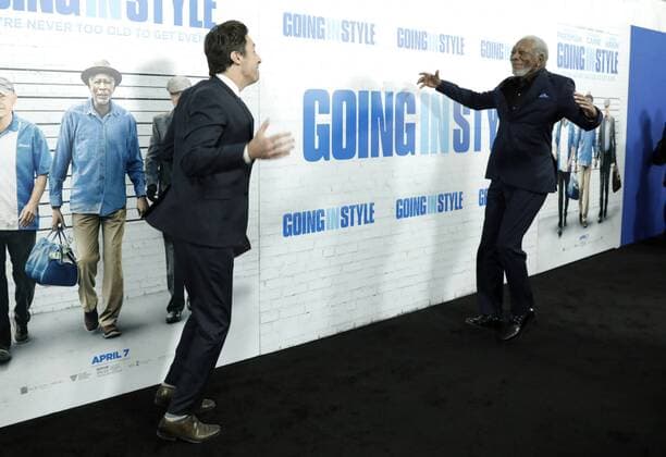 Morgan Freeman and Zach Braff leap at each other when they arrive on the red carpet at the Going in Style World Premiere at SVA Theatre on March 30, 2017 in New York City.  NYP20170330124 JOHNxANGELILLO