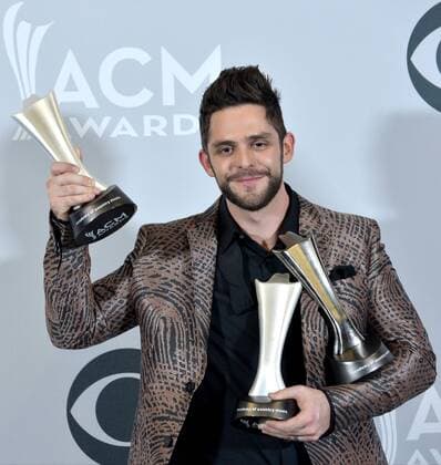 Recording artist Thomas Rhett , winner of the Male Vocalist of the Year and Song of the Year award appears backstage during the 52nd annual Academy of Country Music Awards held at T-Mobile Arena in Las Vegas, Nevada on April 2, 2017. The show will be telecast live on CBS.  LVP20170402248 JIMxRUYMEN