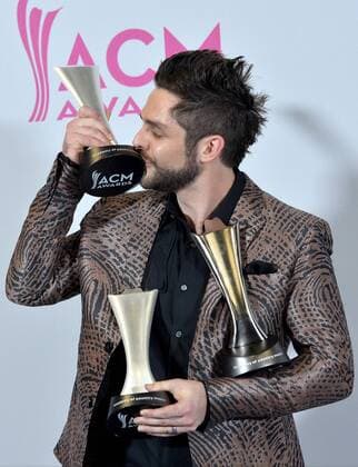 Recording artist Thomas Rhett , winner of the Male Vocalist of the Year and Song of the Year award appears backstage during the 52nd annual Academy of Country Music Awards held at T-Mobile Arena in Las Vegas, Nevada on April 2, 2017. The show will be telecast live on CBS.  LVP20170402249 JIMxRUYMEN