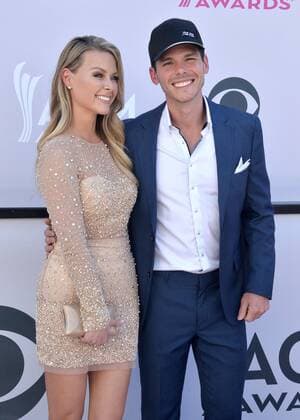 Actress Amber Bartlett (L) and singer-songwriter Granger Smith attend the 52nd annual Academy of Country Music Awards held at T-Mobile Arena in Las Vegas, Nevada on April 2, 2017. The show will be telecast live on CBS.  LVP20170402317 JIMxRUYMEN