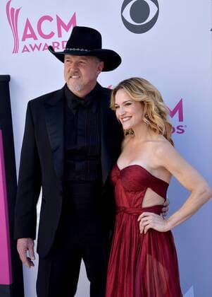 Singer Trace Adkins (L) and Victoria Pratt attend the 52nd annual Academy of Country Music Awards held at T-Mobile Arena in Las Vegas, Nevada on April 2, 2017. The show will be telecast live on CBS.  LVP20170402343 JIMxRUYMEN