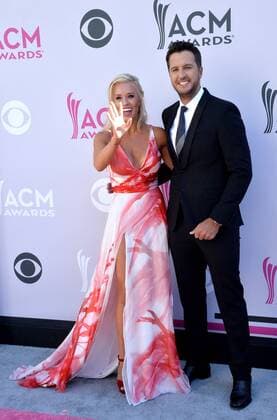 Caroline Boyer (L) and host Luke Bryan attend the 52nd annual Academy of Country Music Awards held at T-Mobile Arena in Las Vegas, Nevada on April 2, 2017. The show will be telecast live on CBS.  LVP20170402376 JIMxRUYMEN