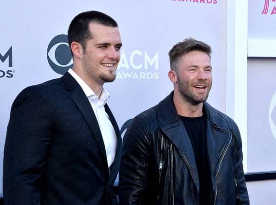 NFL players Derek Carr and Julian Edelman attend the 52nd annual Academy of Country Music Awards held at T-Mobile Arena in Las Vegas, Nevada on April 2, 2017. The show will be telecast live on CBS.  LVP20170402391 JIMxRUYMEN