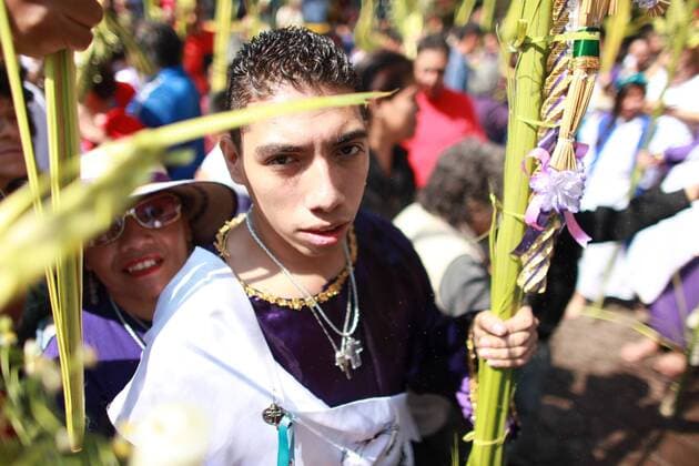April 9, 2017 - Mexico City, Mexico - Roman Catholic devotes During Palm Sunday. Palm fronds are waved to be blessed by a priest to commemorate Palm Sunday which marks the beginning of Holy Week Sunday, April 9, 2017 at the San Lucas church Iztapalapa, Mexico. For Christians, Palm Sunday marks Jesus Christ s entrance into Jerusalem when his followers laid palm branches in his path, prior to his crucifixion. Mexico City Mexico  - ZUMAn230 20170409_zaa_n230_287 Copyright: xEmilioxEspejelx