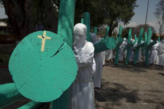 April 13, 2017 - Temascancingo, Estado De Mexico, MEXICO - With more than 100 years of tradition, the Brotherhood of Cruciferos, founded in 1902 enact the traditional walk on the streets in the municipality of Temascalcingo, Estado de Mexico on Thursday, April 13, 2017. More than 150 men of all ages carry the cross as penance, petition or for blessings received during Eastern weekend. ANTONIO NAVA PI Temascancingo MEXICO - ZUMAp124 20170413_zaa_p124_001 Copyright: xAntonoxNavax