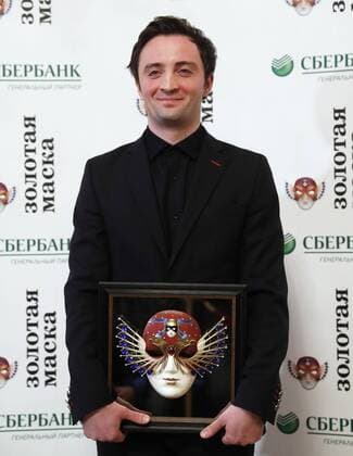MOSCOW, RUSSIA - APRIL 19, 2017: Russian choreographer Anton Pimonov pose with an award for Ballet-Contemporary Dance Best Balletmaster Best Choreographer for Violin Concerto No 2, Mariinsky Theatre, St Petersburg, at the 2017 Golden Mask award ceremony at the Stanislavsky and Nemirovich-Danchenko Moscow Music Theatre. Artyom Geodakyan TASS  TS048DE8