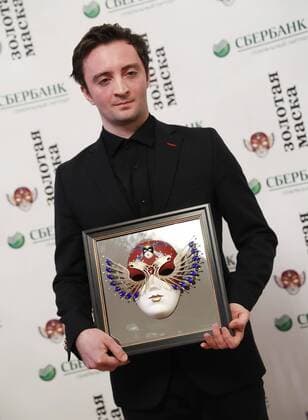 MOSCOW, RUSSIA - APRIL 19, 2017: Russian choreographer Anton Pimonov pose with an award for Ballet-Contemporary Dance Best Balletmaster Best Choreographer for Violin Concerto No 2, Mariinsky Theatre, St Petersburg, at the 2017 Golden Mask award ceremony at the Stanislavsky and Nemirovich-Danchenko Moscow Music Theatre. Artyom Geodakyan TASS  TS048DE9