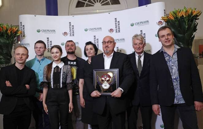 MOSCOW, RUSSIA - APRIL 19, 2017: Russian ballet dancer Igor Bulytsyn (L) who has received an award for Ballet-Contemporary Dance Best Actor for Romeo and Juliet, Opera and Ballet Theatre, Yekaterinburg, and Andrei Shishkin (C), director of the Yekaterinburg Opera and Ballet Theatre, with an award for Ballet Best Production for Romeo and Juliet at the 2017 Golden Mask award ceremony at the Stanislavsky and Nemirovich-Danchenko Moscow Music Theatre. Artyom Geodakyan TASS  TS048DFC