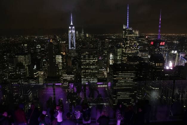 An artist rendering image of Gwyneth Paltrow is projected onto the Empire State Building in the Manhattan skyline to celebrate Harper Bazaar s 150th anniversary on April 19, 2017 in New York City. Spanning 42 floors of the building and rising 500 feet high, the show featured iconic fashion images of everyone from Audrey Hepburn to Kate Moss, including iconic works by the likes of Andy Warhol.  NYP20170419178 JOHNxANGELILLO