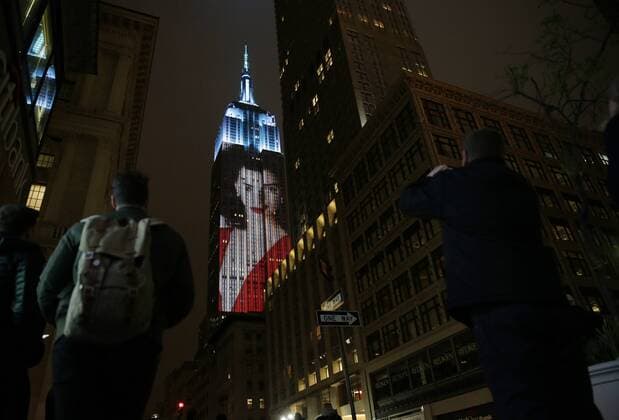 An artist rendering image of Kendall Jenner is projected onto the Empire State Building in the Manhattan skyline to celebrate Harper Bazaar s 150th anniversary on April 19, 2017 in New York City. Spanning 42 floors of the building and rising 500 feet high, the show featured iconic fashion images of everyone from Audrey Hepburn to Kate Moss, including iconic works by the likes of Andy Warhol.  NYP20170419182A JOHNxANGELILLO