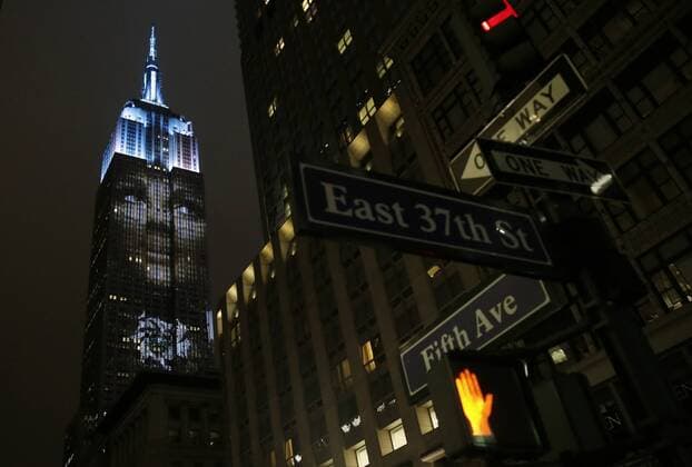 An artist rendering image is projected onto the Empire State Building in the Manhattan skyline to celebrate Harper Bazaar s 150th anniversary on April 19, 2017 in New York City. Spanning 42 floors of the building and rising 500 feet high, the show featured iconic fashion images of everyone from Audrey Hepburn to Kate Moss, including iconic works by the likes of Andy Warhol.  NYP20170419295 JOHNxANGELILLO