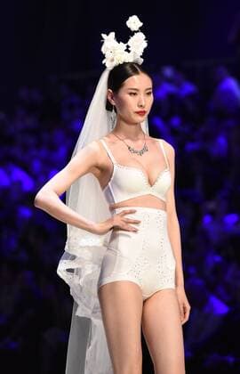 April 19, 2017 - Shenzhen, Shenzhen, China - Shenzhen, CHINA-April 19 2017: (EDITORIAL USE ONLY. CHINA OUT) A model presents one piece of Oleno creation during the 2017 China (Shenzhen) International Brand Underwear Fair in south China s Shenzhen, April 19th, 2017. Shenzhen China  - ZUMAs145 20170419_zaa_s145_207 Copyright: xOuxJinweix
