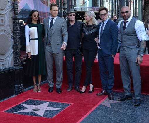 Actor Chris Pratt is joined by his Guardians of the Galaxy Vol. 2 cast members Zoe Saldana, (Pratt,) Michael Rooker, Pom Klementieff, Writer director James Gunn and Dave Bautista (-R) during an unveiling ceremony honoring him with the 2,607th star on the Hollywood Walk of Fame in Los Angeles on April 21, 2017.  LAP2017042113 JIMxRUYMEN