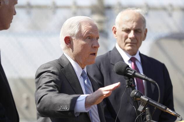 April 21, 2017 - San Ysidro, CA, USA - Attorney General Jeff Sessions, center makes a point in his first joint appearance along AmericaÃ¢â‚¬â ¢s Southern border with US Senator Ron Johnson from Wisconsin, left, and Homeland Security Secretary John Kelly, right. San Ysidro USA - ZUMAga3_ 20170421_zap_ga3_001 Copyright: xJohnxGastaldox