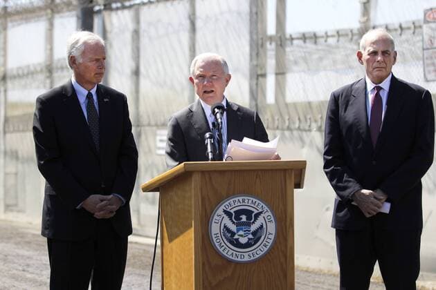 April 21, 2017 - San Ysidro, CA, USA - Homeland Security Secretary John Kelly, right, and Attorney General Jeff Sessions, center, make their first joint appearance along AmericaÃ¢â‚¬â ¢s Southern border with US Senator Ron Johnson from Wisconsin. San Ysidro USA - ZUMAga3_ 20170421_zap_ga3_006 Copyright: xJohnxGastaldox