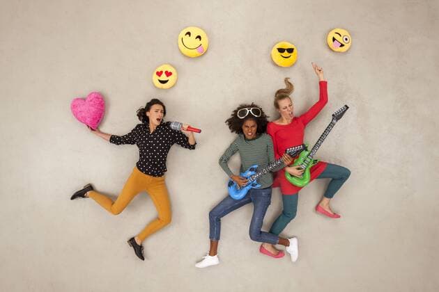 Friends playing music in a rock band model released Symbolfoto  BAEF01284