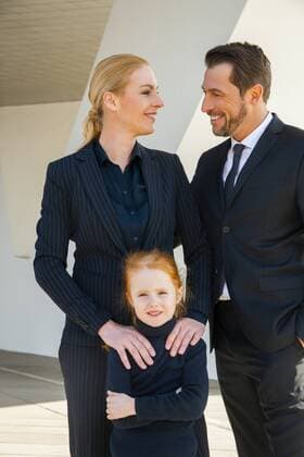 Smiling businessman and businesswoman with girl model released Symbolfoto property released  CHAF01838