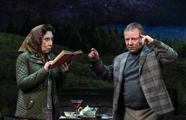 MOSCOW, RUSSIA - APRIL 24, 2017: Actress Inna Churikova (L) as Queen Elizabeth II and actor Sergei Pinegin as Harold Wilson in a scene during a pre-premiere of Peter Morgan s play The Audience staged by Gleb Panfilov at the Theatre of Nations. The play tells about Queen Elizabeth II s weekly meetings with prime ministers. Valery Sharifulin TASS  TS049785