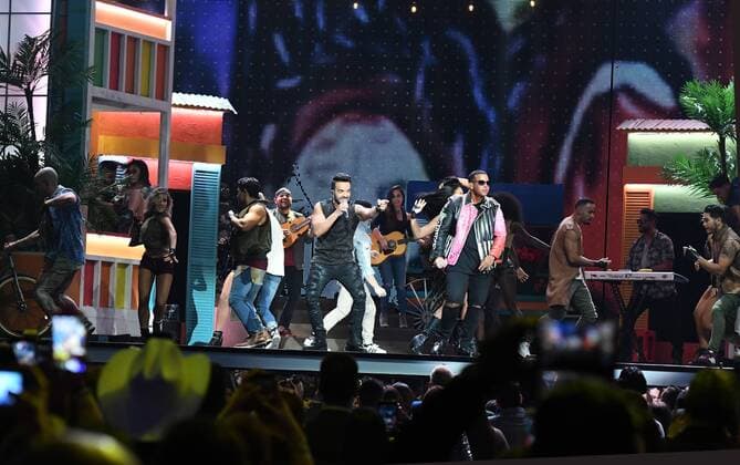Latin artist Daddy Yankee (R) and Luis Fonsi perform during the 2017 Billboard Latin Music Awards and Show at the Bank United Center, University of Miami, Miami, Florida on April 27, 2017.  MIA201704272694 GARYxIxROTHSTEIN