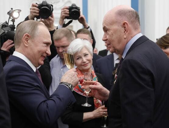 MOSCOW, RUSSIA - APRIL 28, 2017: Russia s President Vladimir Putin and chief physician of the Ochapovsky Regional Clinical Hospital No 1 (Krasnodar Territory), Vladimir Porkhanov (L-R front) drink champagne after an award ceremony to present the Hero of Labour of the Russian Federation medals at Moscow s Kremlin. The Hero of Labour of the Russian Federation title is bestowed on Russian citizens for their contribution to Russia s society, economy, culture, education, industry, and agriculture. Mikhail Metzel TASS  TS04A03F