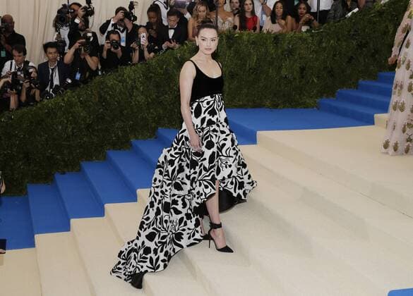 Daisy Ridley arrives on the red carpet at the Costume Institute Benefit at The Metropolitan Museum of Art celebrating the opening of Rei Kawakubo Comme des Garcons: Art of the In-Between in New York City on May 1, 2017.  NYP20170501127 JOHNxANGELILLO