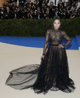 La La arrives on the red carpet at the Costume Institute Benefit at The Metropolitan Museum of Art celebrating the opening of Rei Kawakubo Comme des Garcons: Art of the In-Between in New York City on May 1, 2017.  NYP20170501129 JOHNxANGELILLO