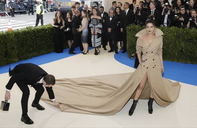 Priyanka Chopra arrives on the red carpet at the Costume Institute Benefit at The Metropolitan Museum of Art celebrating the opening of Rei Kawakubo Comme des Garcons: Art of the In-Between in New York City on May 1, 2017.  NYP20170501146 JOHNxANGELILLO