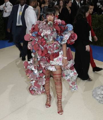 Rihanna arrives on the red carpet at the Costume Institute Benefit at The Metropolitan Museum of Art celebrating the opening of Rei Kawakubo Comme des Garcons: Art of the In-Between in New York City on May 1, 2017.  NYP20170501541 JOHNxANGELILLO