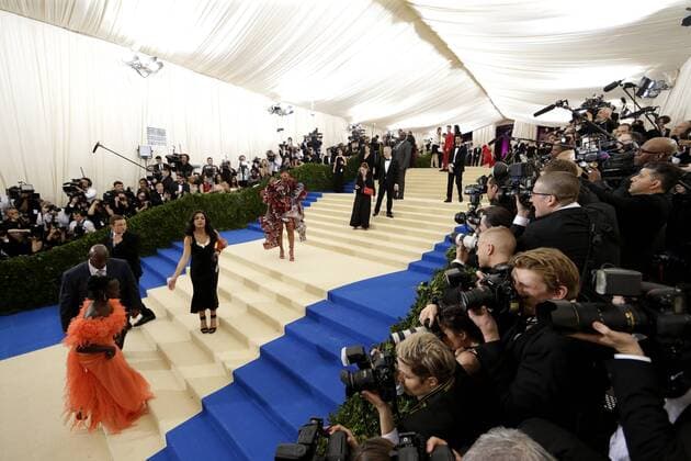 Rihanna arrives on the red carpet at the Costume Institute Benefit at The Metropolitan Museum of Art celebrating the opening of Rei Kawakubo Comme des Garcons: Art of the In-Between in New York City on May 1, 2017.  NYP20170501544 JOHNxANGELILLO