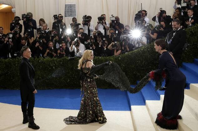 Sarah Paulson and Madonna arrive on the red carpet at the Costume Institute Benefit at The Metropolitan Museum of Art celebrating the opening of Rei Kawakubo Comme des Garcons: Art of the In-Between in New York City on May 1, 2017.  NYP20170501545 JOHNxANGELILLO
