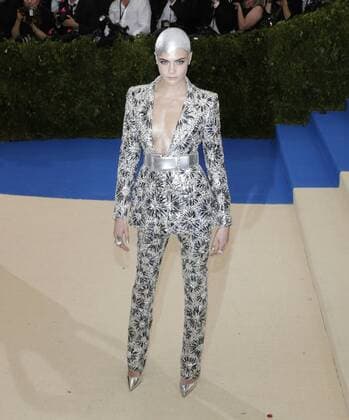 Cara Delevingne arrives on the red carpet at the Costume Institute Benefit at The Metropolitan Museum of Art celebrating the opening of Rei Kawakubo Comme des Garcons: Art of the In-Between in New York City on May 1, 2017.  NYP20170501558 JOHNxANGELILLO