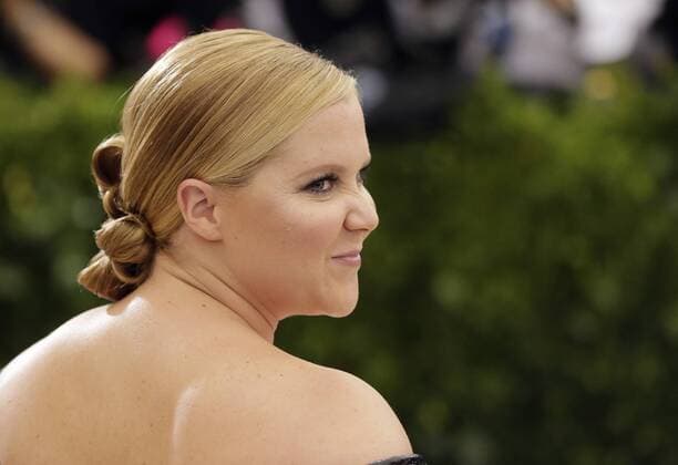 Amy Schumer arrive on the red carpet at the Costume Institute Benefit at The Metropolitan Museum of Art celebrating the opening of Rei Kawakubo Comme des Garcons: Art of the In-Between in New York City on May 1, 2017.  NYP20170501567 JOHNxANGELILLO