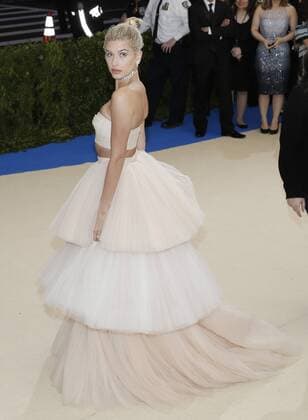 Hailey Baldwin arrives on the red carpet at the Costume Institute Benefit at The Metropolitan Museum of Art celebrating the opening of Rei Kawakubo Comme des Garcons: Art of the In-Between in New York City on May 1, 2017.  NYP20170501603 JOHNxANGELILLO