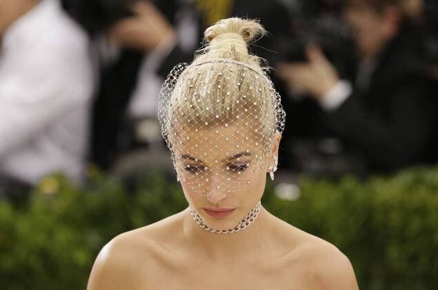Hailey Baldwin arrives on the red carpet at the Costume Institute Benefit at The Metropolitan Museum of Art celebrating the opening of Rei Kawakubo Comme des Garcons: Art of the In-Between in New York City on May 1, 2017.  NYP20170501605 JOHNxANGELILLO