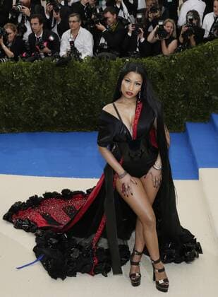 Nicki Minaj arrives on the red carpet at the Costume Institute Benefit at The Metropolitan Museum of Art celebrating the opening of Rei Kawakubo Comme des Garcons: Art of the In-Between in New York City on May 1, 2017.  NYP20170501609 JOHNxANGELILLO