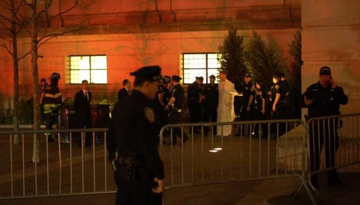 Russian artist Fyodor Pavlov-Andreevich, 41, was arrested at Metropolitan Museum of Art during Met Gala 2017 for appearing nude inside of a clear fiberglass box. The box, originally covered by a white sheet, was dropped off by a group of anonymous handlers in a restricted area near the museum, close to East Eighty-Third Street and Fifth Avenue. Members of the NYPD quickly apprehended Pavlov-Andreevich. The artist refused to leave the box, so firefighters were forced to cut it open. In picture: police wrapped Fyodor Pavlov-Andreevich in a white sheet after he was removed from a box outside the Metropolitan Museum of Art. Photo from nydailynews.com nydailynews.com 