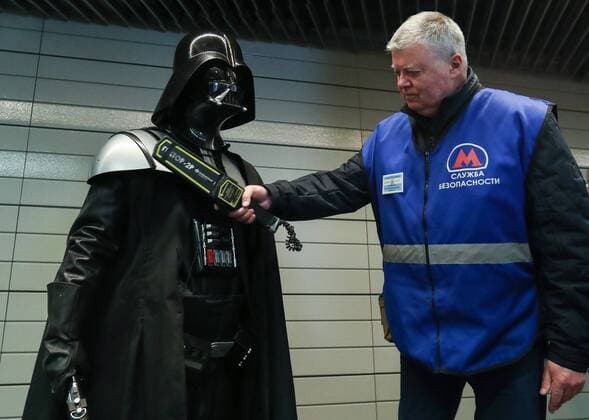 MOSCOW, RUSSIA - MAY 4, 2017: A man dressed as Darth Vader (L) and a Moscow Metro employee seen during the Star Wars Day flash mob at Lermontovsky Prospekt Station of the Moscow Metro. Vyacheslav Prokofyev TASS  TS04AA81