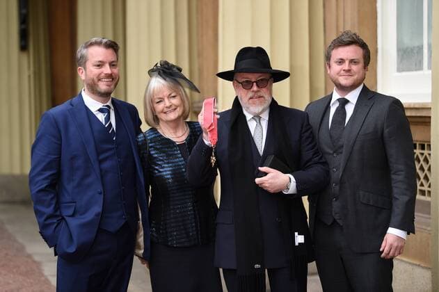 . 05 05 2017. London, United Kingdom. Political cartoonist Peter Brookes and his family with his CBE after at an Investiture at Buckingham Palace in London.  xCPNAx xi-Imagesx IIM-15042-0033