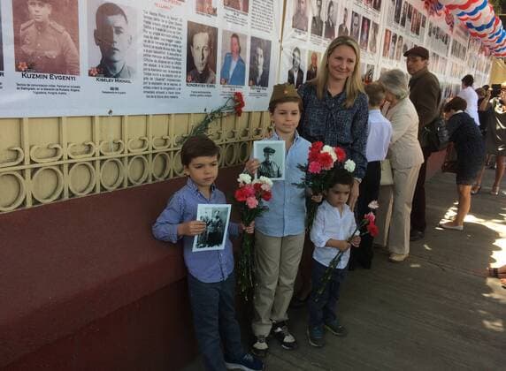 MEXICO CITY, MEXICO - MAY 6, 2017: People attend the unveiling of Memory Wall as part of an Immortal Regiment memorial event marking the 72nd anniversary of the Victory over Nazi Germany in the Second World War, outside the Russian Embassy in Mexico. Ivan Valyuk TASS  TS04AE12