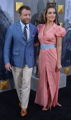 Director and writer Guy Ritchie and his wife, English model Jacqui Ainsley attend the premiere of his new motion picture fantasy King Arthur: Legend of the Sword at TCL Chinese Theatre in the Hollywood section of Los Angeles on May 8, 2017. Storyline: Robbed of his birthright, Arthur comes up the hard way in the back alleys of the city. But once he pulls the sword from the stone, he is forced to acknowledge his true legacy - whether he likes it or not.  LAP20170508906 JIMxRUYMEN
