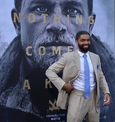 Cast member Kingsley Ben-Adir attends the premiere of the motion picture fantasy King Arthur: Legend of the Sword at TCL Chinese Theatre in the Hollywood section of Los Angeles on May 8, 2017. Storyline: Robbed of his birthright, Arthur comes up the hard way in the back alleys of the city. But once he pulls the sword from the stone, he is forced to acknowledge his true legacy - whether he likes it or not.  LAP20170508929 JIMxRUYMEN