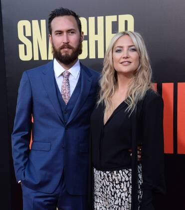 Actress Kate Hudson and musician Danny Fujikawa attend the premiere of the motion picture comedy Snatched at the Regency Village Theatre in the Westwood section of Los Angeles on May 10, 2017. Storyline: When her boyfriend dumps her before their exotic vacation, a young woman persuades her ultra-cautious mother to travel with her to paradise, with unexpected results.  LAP2017051099 JIMxRUYMEN
