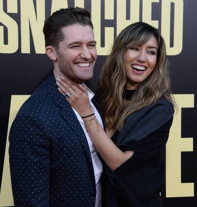 Actor Matthew Morrison and his wife Renee Puente attend the premiere of the motion picture comedy Snatched at the Regency Village Theatre in the Westwood section of Los Angeles on May 10, 2017. Storyline: When her boyfriend dumps her before their exotic vacation, a young woman persuades her ultra-cautious mother to travel with her to paradise, with unexpected results.  LAP2017051044 JIMxRUYMEN