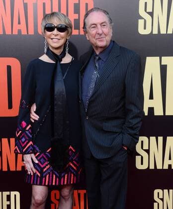 Actor Eric Idle (R) and his wifeTania Kosevich attend the premiere of the motion picture comedy Snatched at the Regency Village Theatre in the Westwood section of Los Angeles on May 10, 2017. Storyline: When her boyfriend dumps her before their exotic vacation, a young woman persuades her ultra-cautious mother to travel with her to paradise, with unexpected results.  LAP2017051058 JIMxRUYMEN