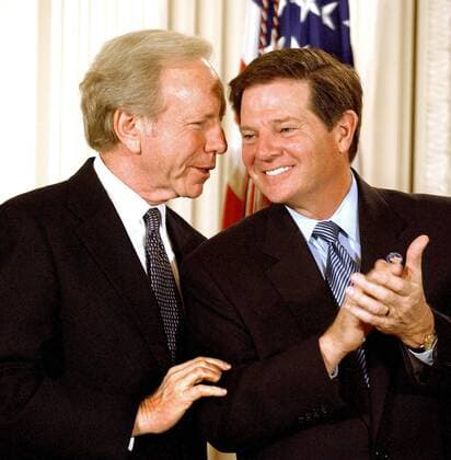 November 25, 2002 - Washington, District of Columbia, United States of America - United States Senator Joe Lieberman (Democrat of Connecticut), left, shares some thoughts with incoming US House Majority Leader Tom DeLay (Republican of Texas) during the signing ceremony for the Homeland Security Bill at the White House in WashingtonDC on 25 November, 2002..Credit: CNP Washington United States of America - ZUMAs152 20021125_zaa_s152_001 Copyright: xRonxSachsx