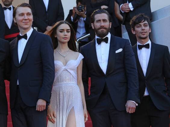 (From L to R) Paul Dano, Lily Collins, Jake Gyllenhaal and Devon Bostic arrive on the red carpet before the screening of the film Okja during the 70th annual Cannes International Film Festival in Cannes, France on May 19, 2017.  CAN20170519109 DAVIDxSILPA