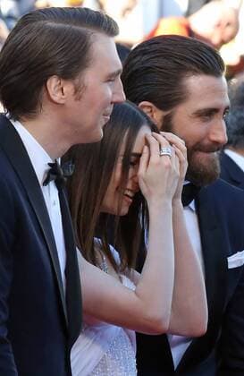 Paul Dano (L), Lily Collins (C) and Jake Gyllenhaal arrive on the red carpet before the screening of the film Okja during the 70th annual Cannes International Film Festival in Cannes, France on May 19, 2017.  CAN20170519103 DAVIDxSILPA